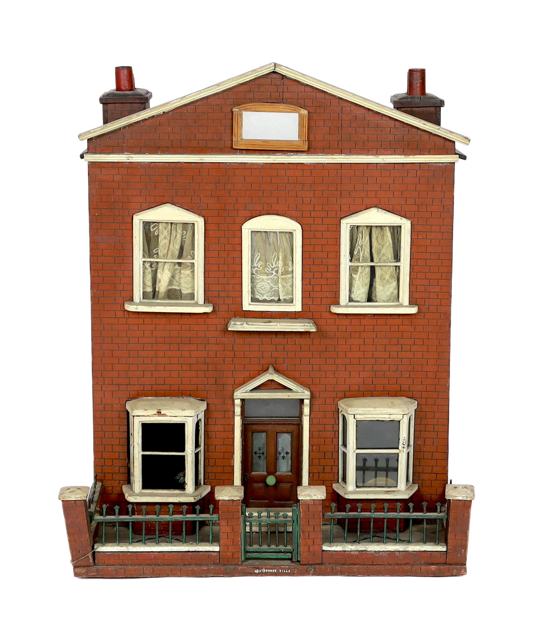 A back-opening furnished English dolls’ house, late 19th century, 74cm high